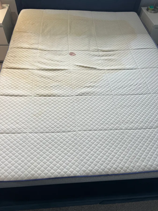 Sweat-marked mattress refreshed in Staffordshire, before professional cleaning