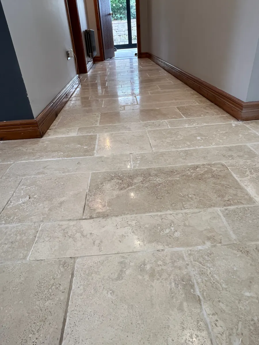 Restored tiled hallway floor in Staffordshire after professional cleaning, shown before and after, after professional cleaning