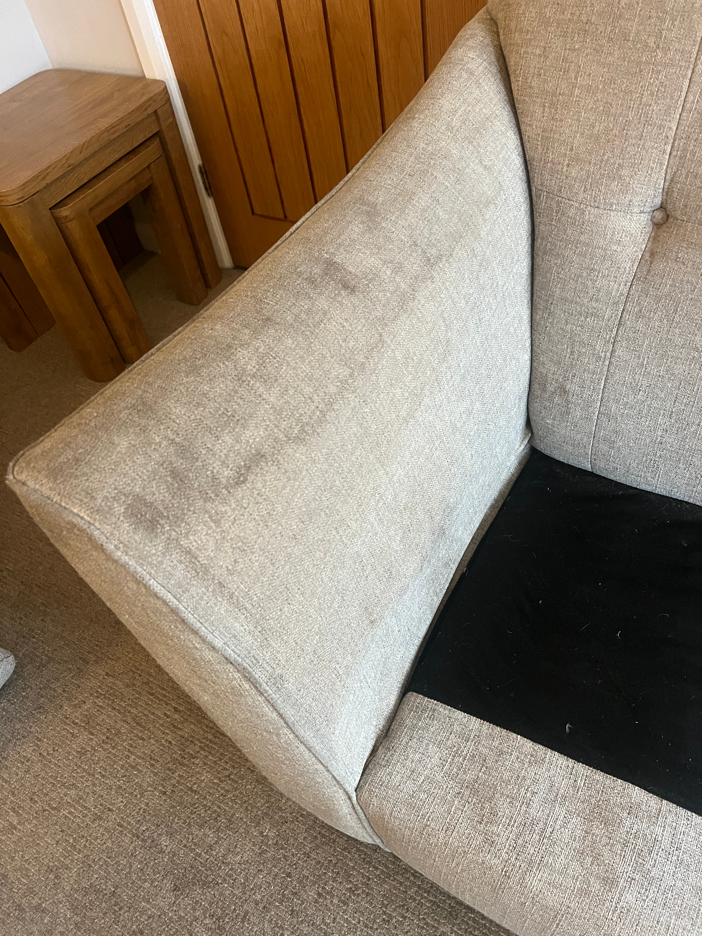 Stained sofa cushion cleaned in Staffordshire, before professional cleaning