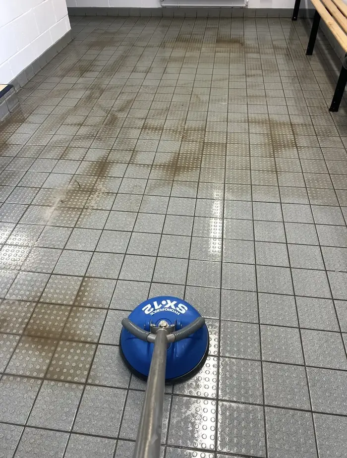 Restored tiled hallway floor in Staffordshire after professional cleaning, shown before and after, before professional cleaning