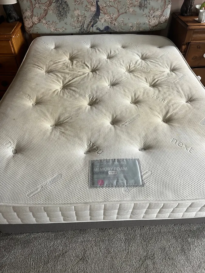 Stained mattress corner cleaned in Staffordshire, before professional cleaning
